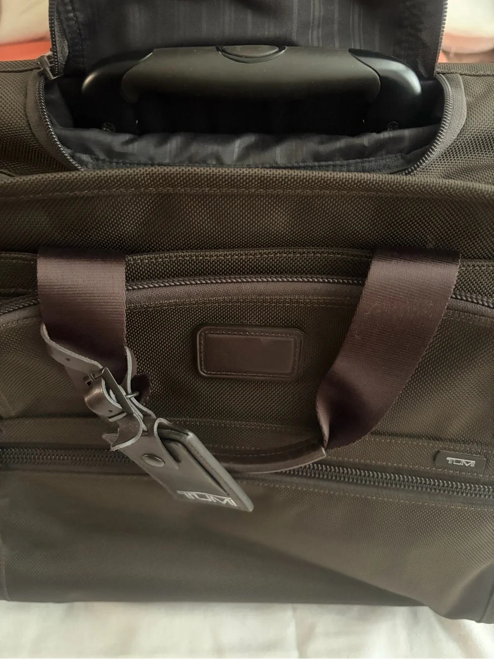 Tumi rolling briefcase